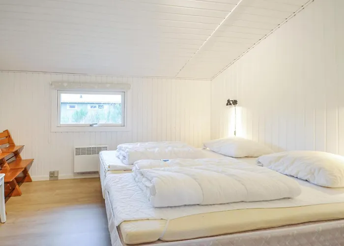 Four-bedroom In Hébergement de vacances